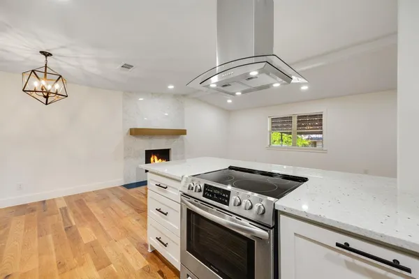 a view of a kitchen with a sink