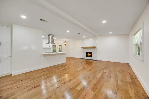 a view of a patio with chairs and backyard