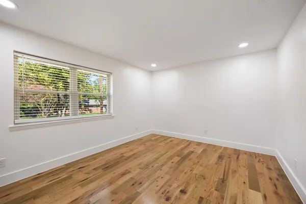 a bathroom with a shower and a sink
