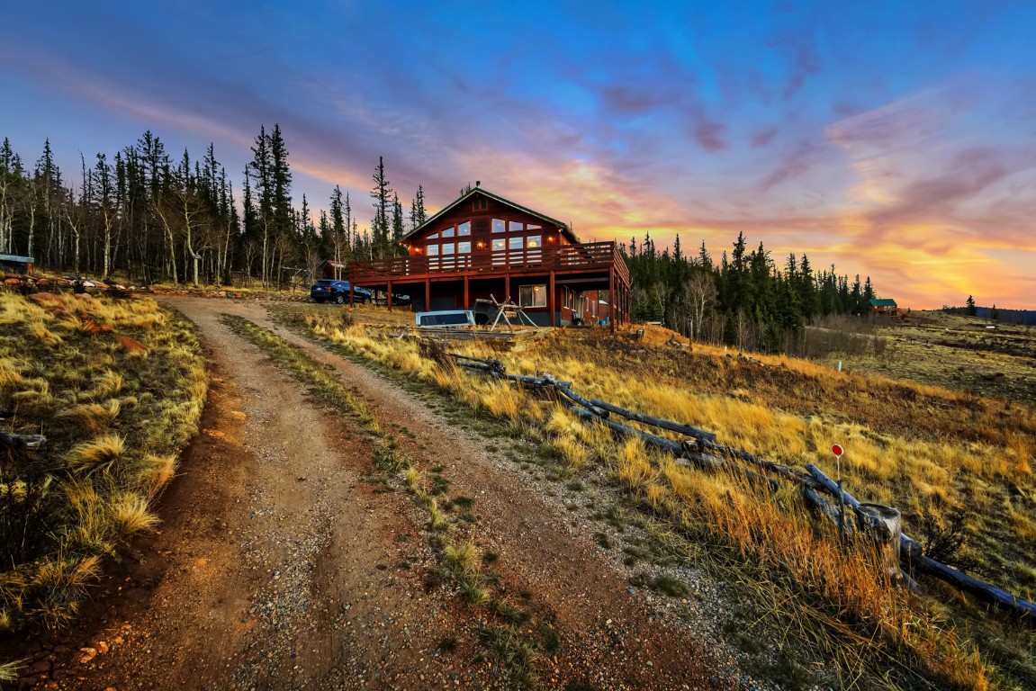 64 Flint Circle Como, CO 80456 - Photo 34 of 35 a view of a house with a yard