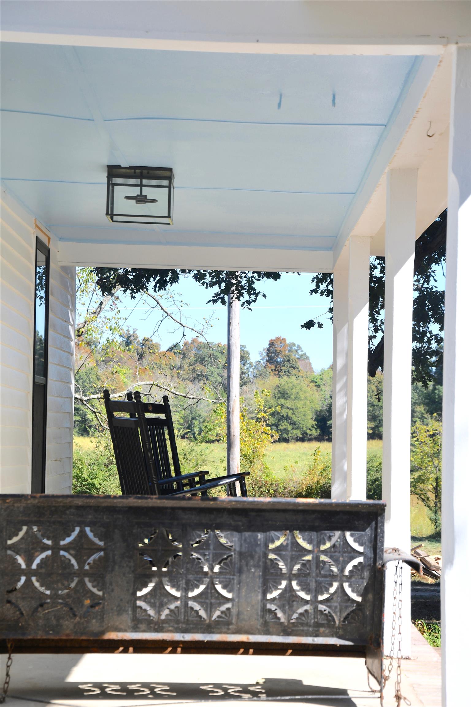 7803 Tatum Road Lyles, TN 37098 - Photo 2 of 18 Gorgeous Front Porch - Perfect for Rocking Chair Front Porch - Ceiling is painted "Haint Blue"
