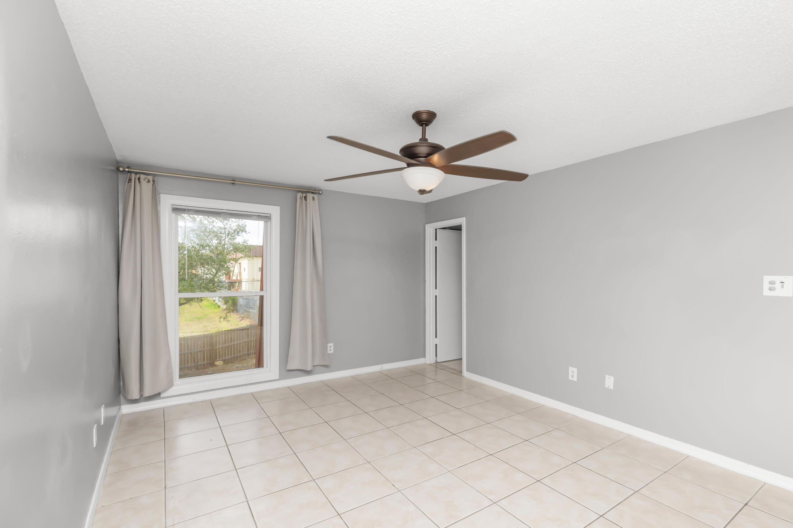 210 Pelham Road, Unit 219A Fort Walton Beach, FL 32547 - Photo 22 of 34 a view of an empty room and window