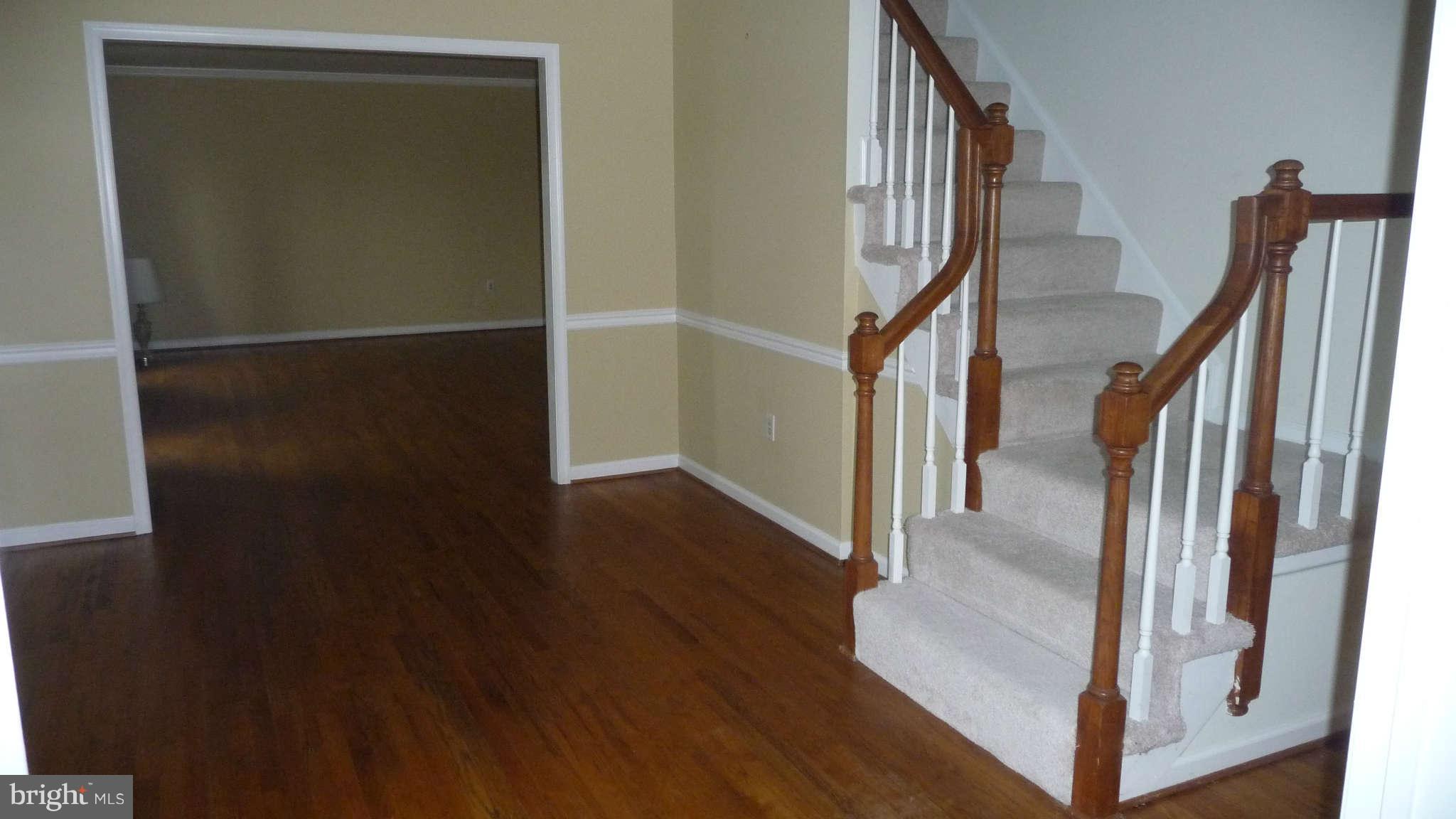 14703 Argyle Club Road Silver Spring, MD 20906 - Photo 11 of 29 Foyer and stairs to 2nd Floor