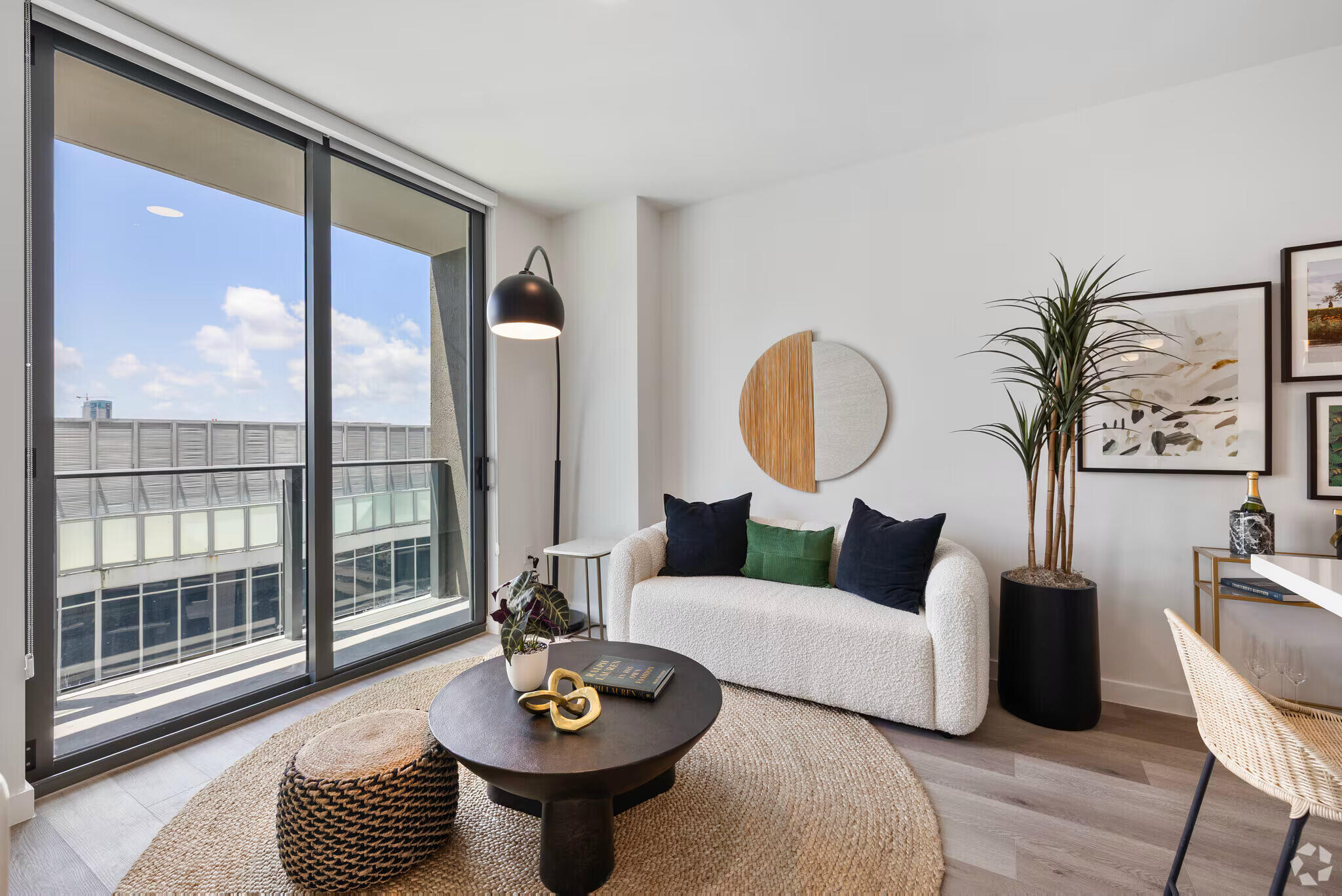 201 Southwest 10th Street, Unit 1407 Miami, FL 33130 - Photo 15 of 17 a living room with furniture and a large window