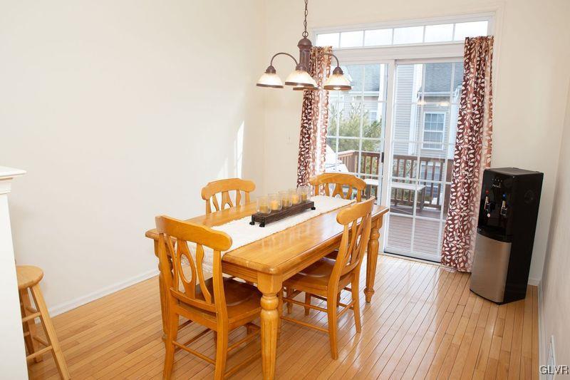 147 Pinehurst Lane Easton, PA 18042 - Photo 13 of 31 a view of a dining room with furniture window and wooden floor