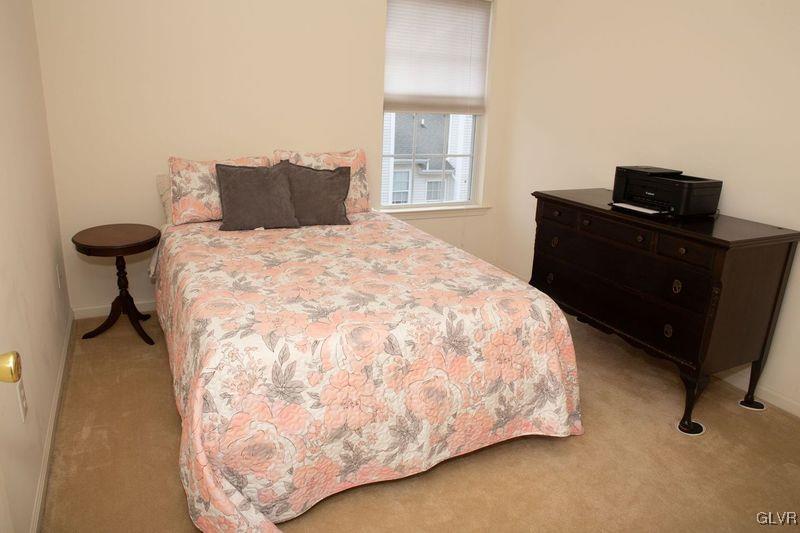 147 Pinehurst Lane Easton, PA 18042 - Photo 18 of 31 a bedroom with a bed and a desk