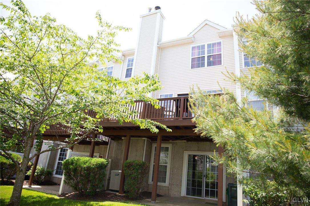 147 Pinehurst Lane Easton, PA 18042 - Photo 25 of 31 a view of a house with brick walls and a tree