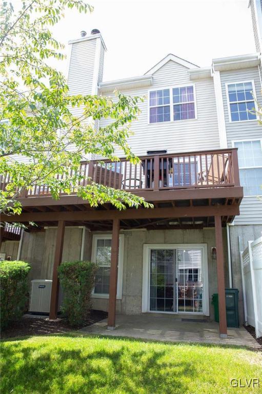 147 Pinehurst Lane Easton, PA 18042 - Photo 26 of 31 a view of a house with large windows and plants