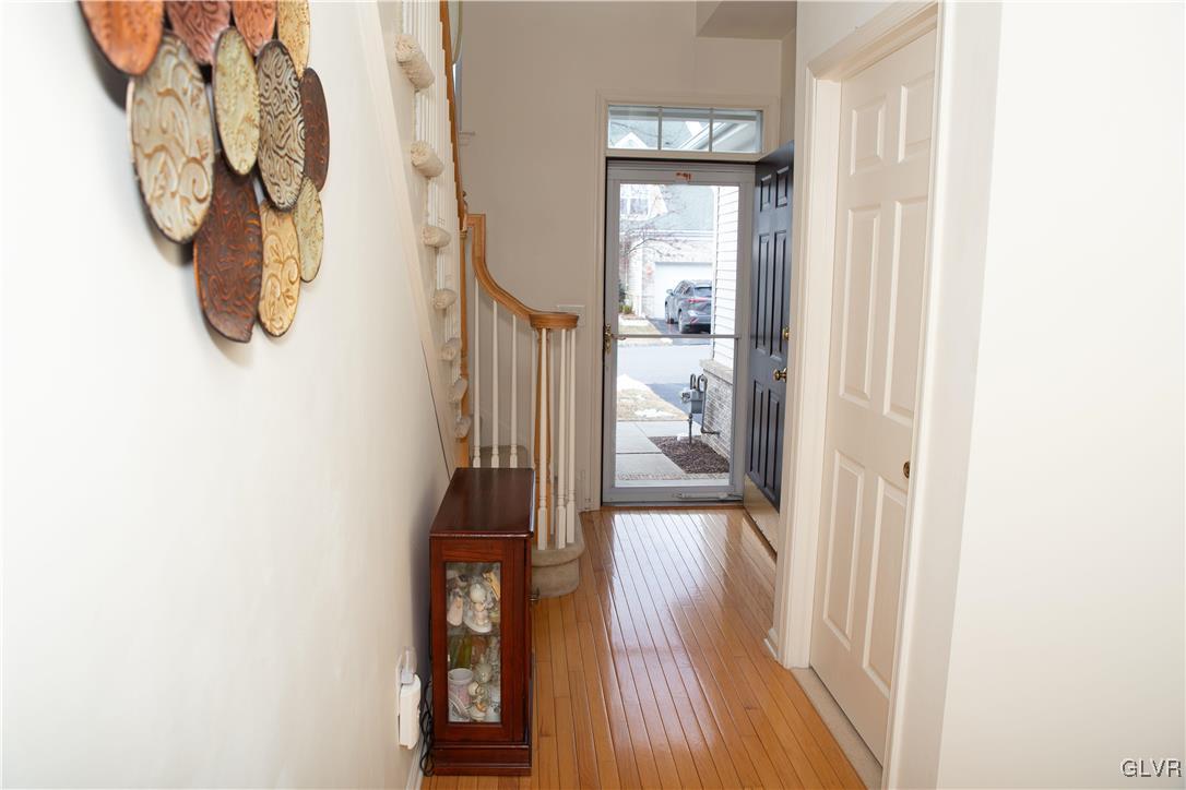 147 Pinehurst Lane Easton, PA 18042 - Photo 4 of 31 a view of a hallway with wooden floor and entryway