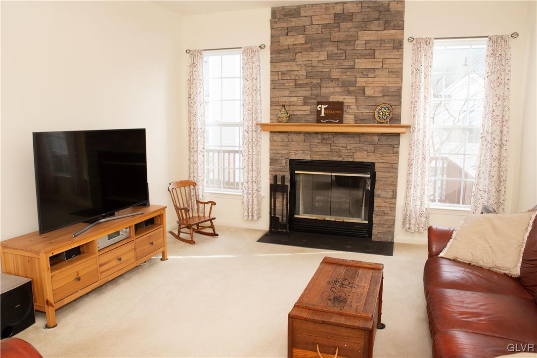 147 Pinehurst Lane Easton, PA 18042 - Photo 5 of 31 a living room with furniture and a flat screen tv