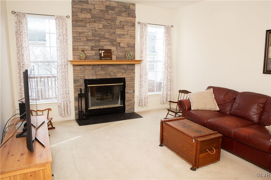 147 Pinehurst Lane Easton, PA 18042 - Photo 6 of 31 a living room with furniture and a fireplace
