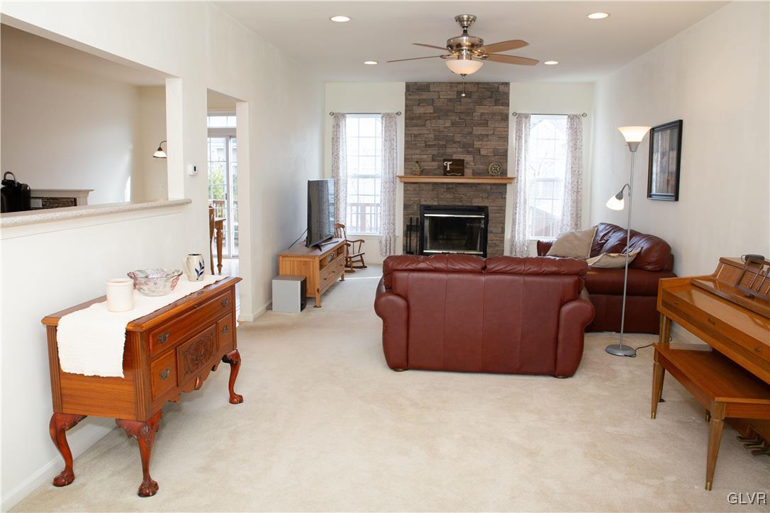 147 Pinehurst Lane Easton, PA 18042 - Photo 7 of 31 a living room with furniture fireplace and window