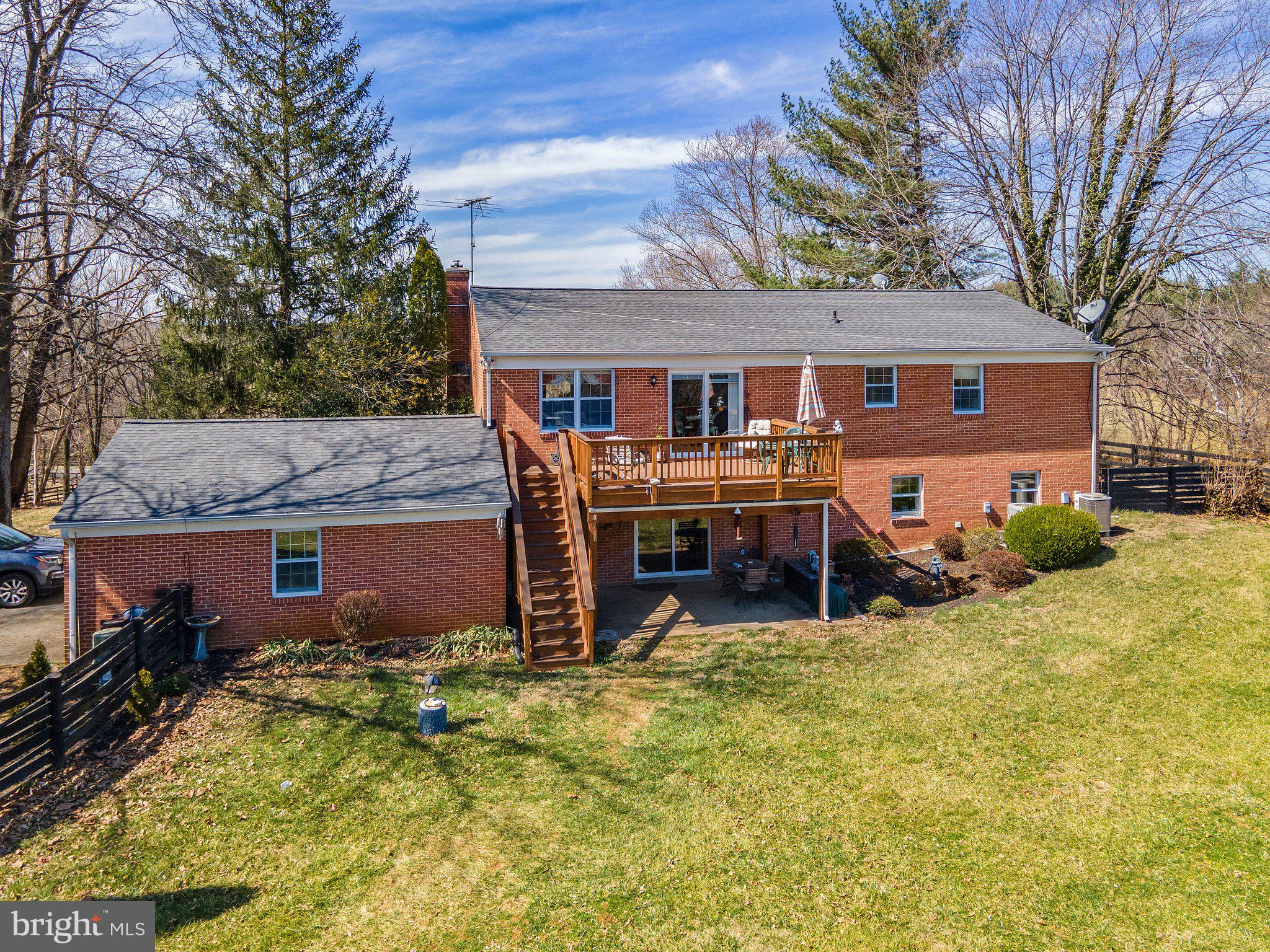 16402 Hamilton Station Road Waterford, VA 20197 - Photo 4 of 53 Back of the home showing deck & patio