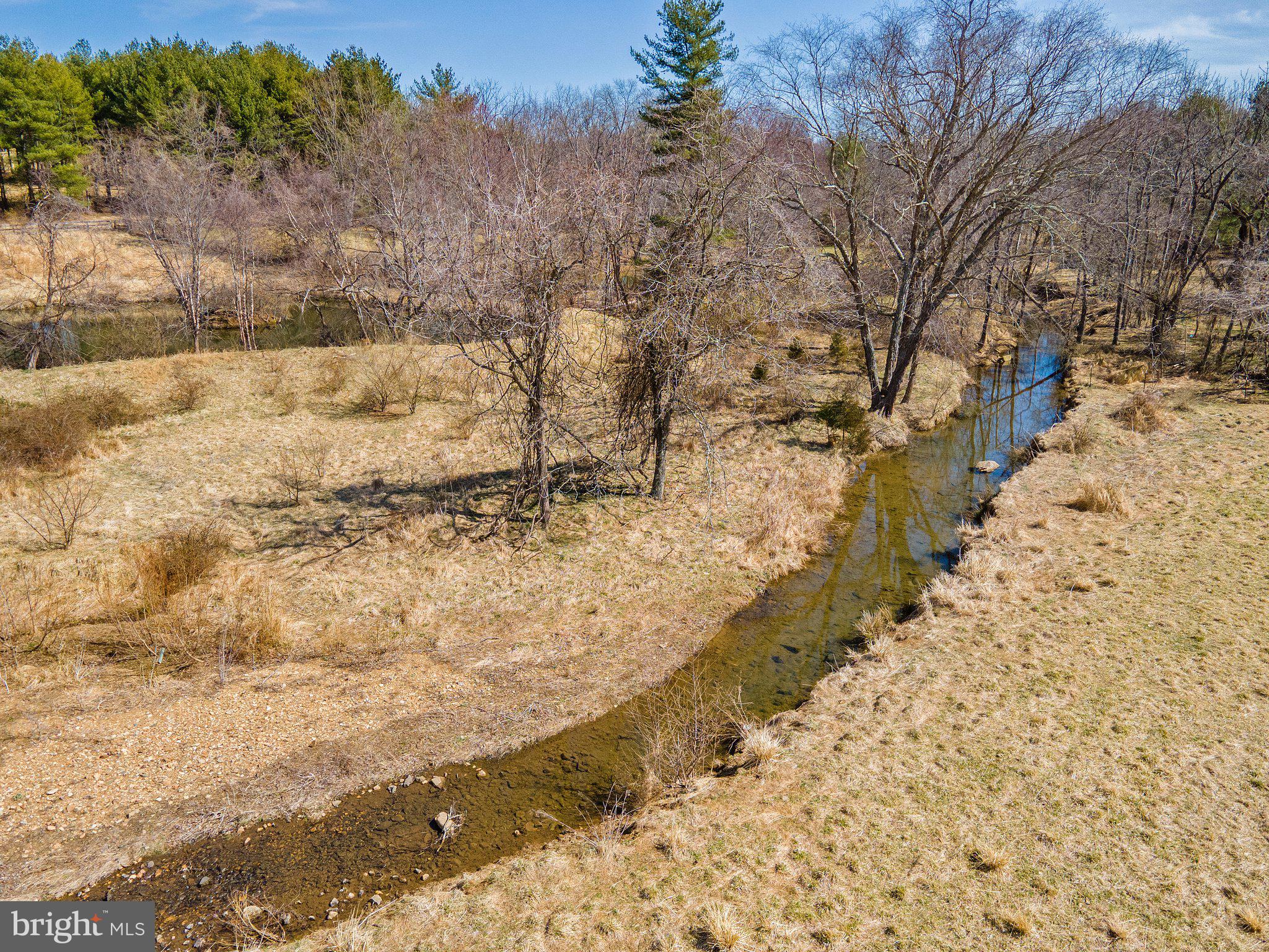 16402 Hamilton Station Road Waterford, VA 20197 - Photo 45 of 53 creek that runs through the land