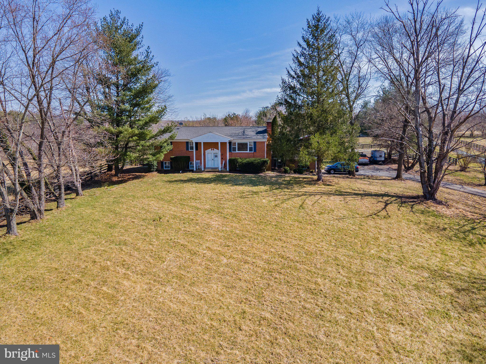 16402 Hamilton Station Road Waterford, VA 20197 - Photo 6 of 53 Home is sited on a hill away from the road