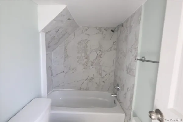 a bathroom with a bathtub