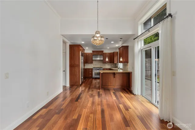 a view of kitchen with wooden floor