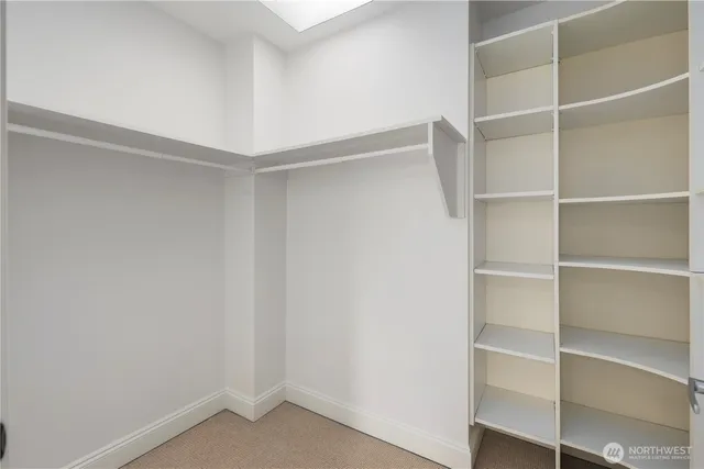 a view of an empty walk in closet