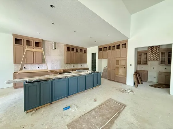 a large bathroom with double vanity and a sink