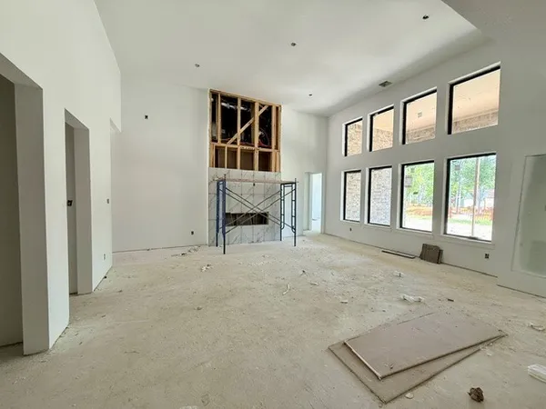 an empty room with windows