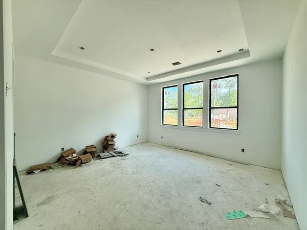 an empty room with windows
