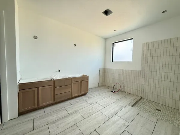 a view of a livingroom with natural light
