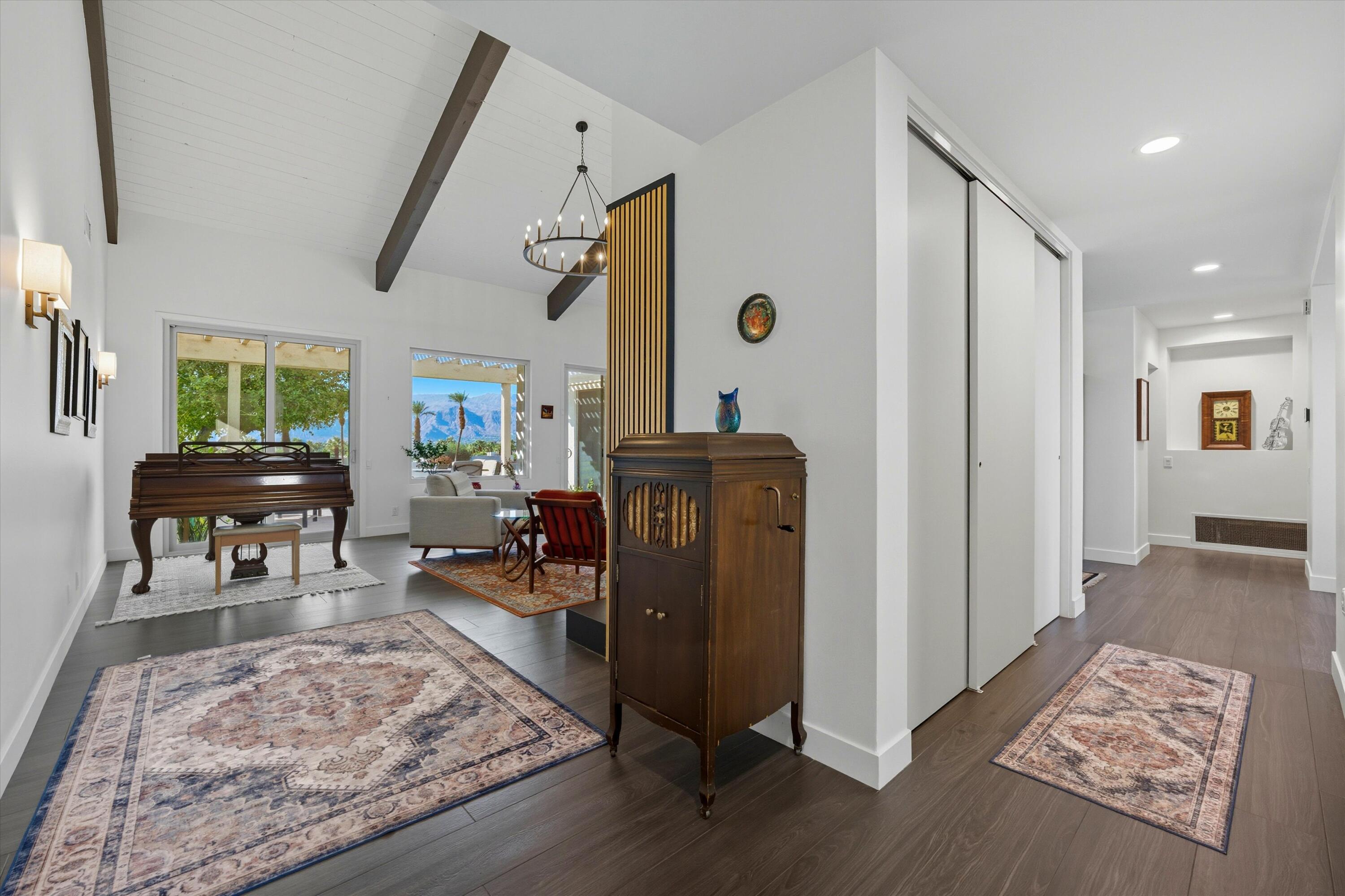 809 Inverness Drive Rancho Mirage, CA 92270 - Photo 12 of 36 a living room with furniture and a rug