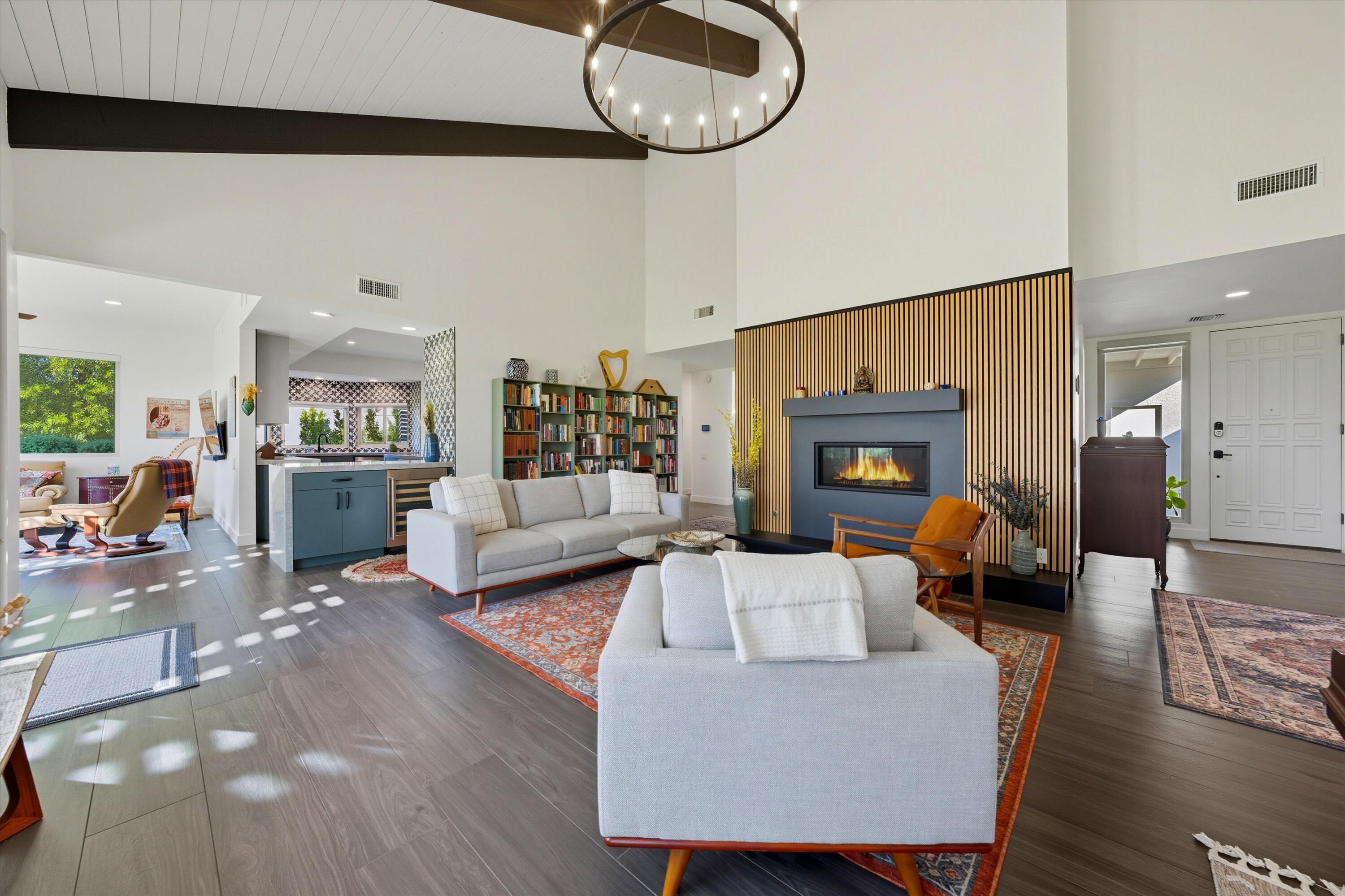 809 Inverness Drive Rancho Mirage, CA 92270 - Photo 14 of 36 a living room with furniture and a fireplace
