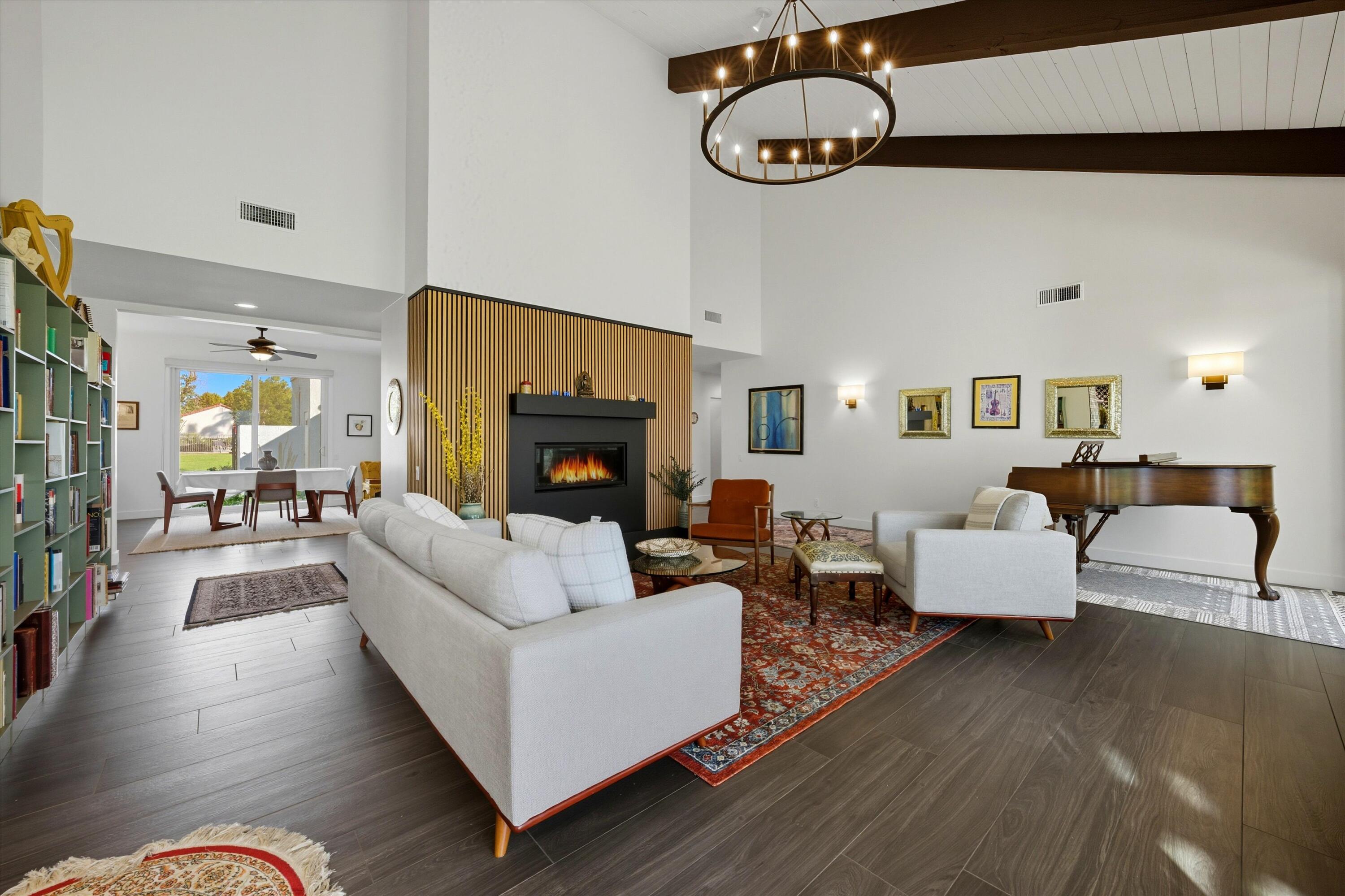 809 Inverness Drive Rancho Mirage, CA 92270 - Photo 15 of 36 a living room with furniture and a fireplace
