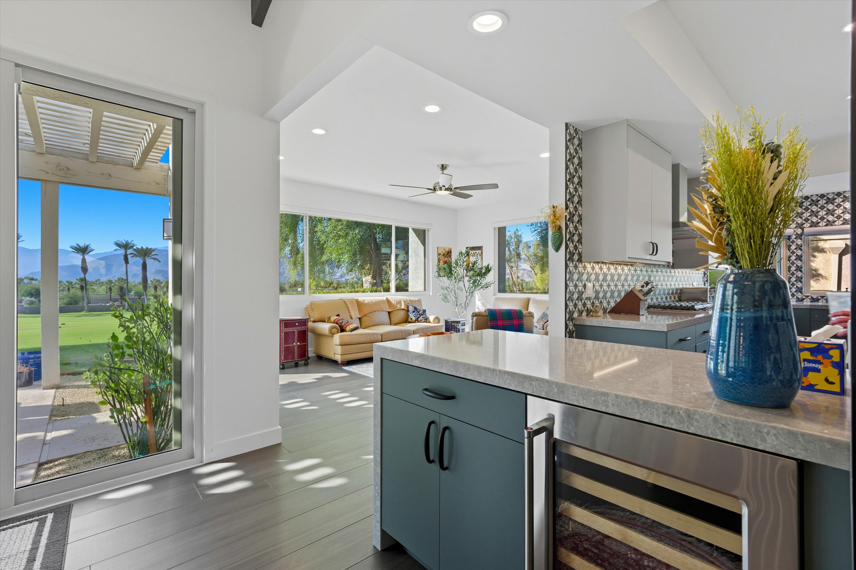 809 Inverness Drive Rancho Mirage, CA 92270 - Photo 17 of 36 a kitchen with sink refrigerator and stove