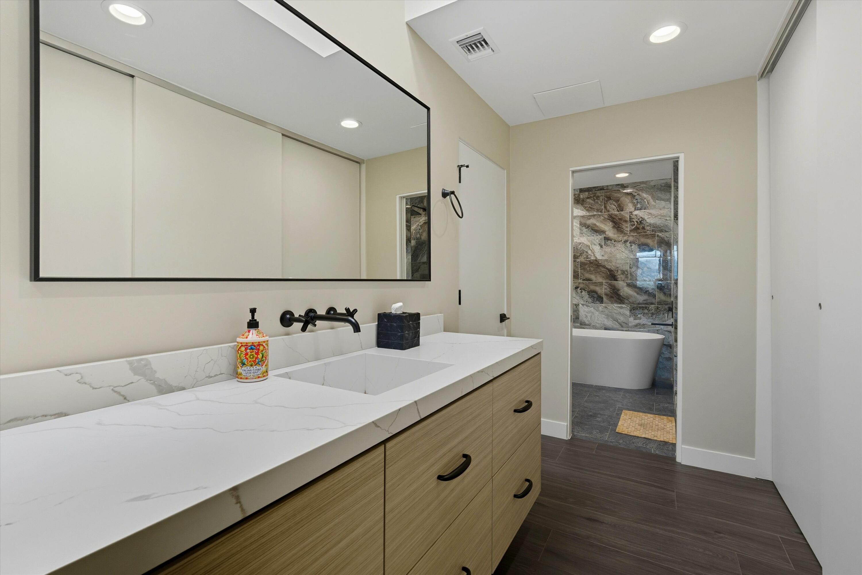 809 Inverness Drive Rancho Mirage, CA 92270 - Photo 33 of 36 a bathroom with a sink a toilet and shower