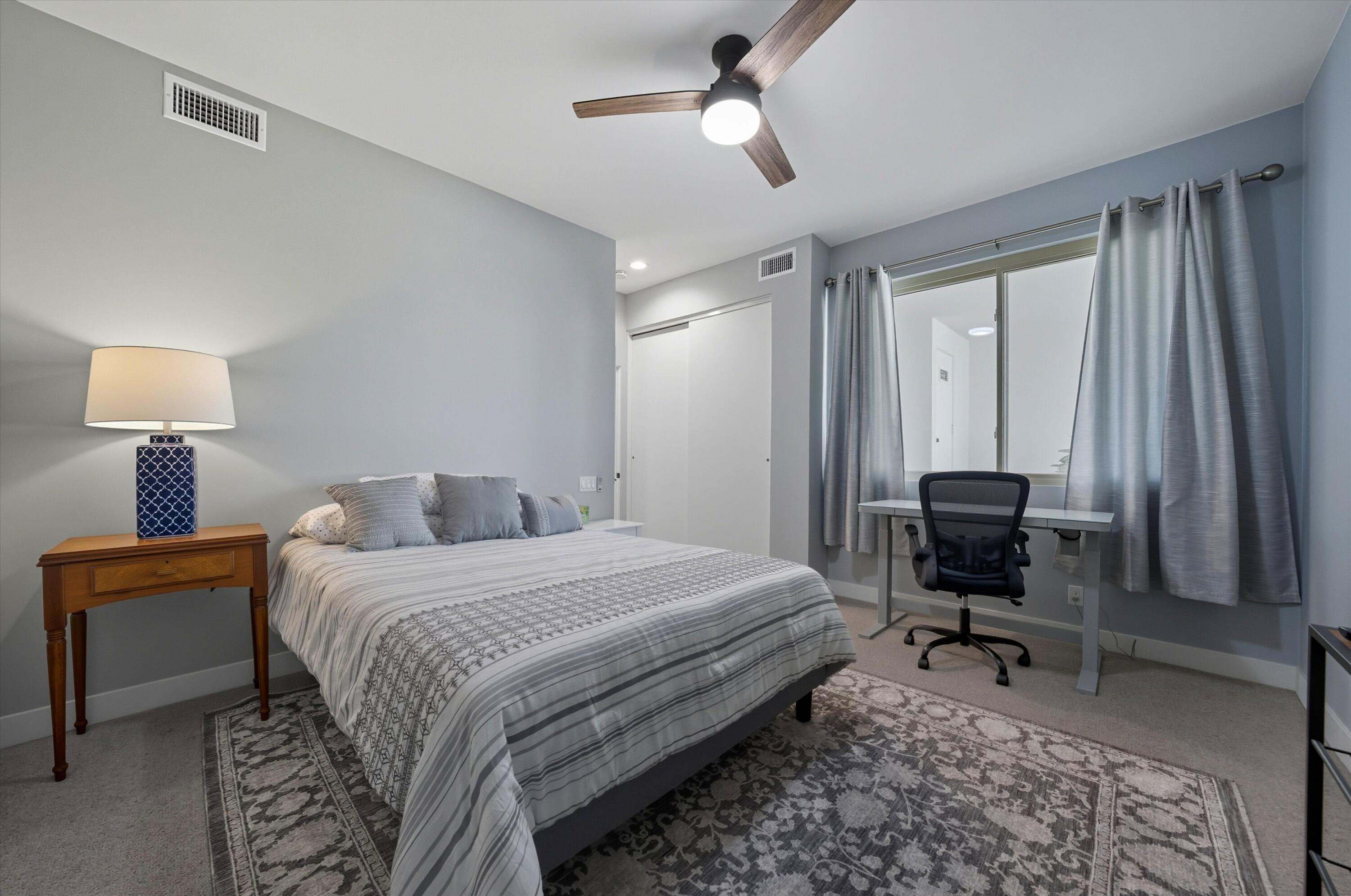 809 Inverness Drive Rancho Mirage, CA 92270 - Photo 35 of 36 a bedroom with a bed and a chandelier