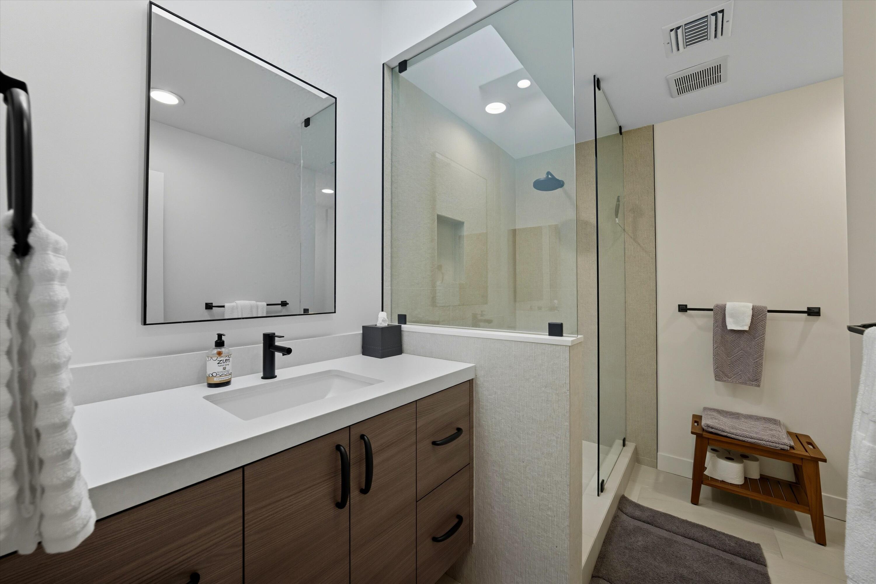 809 Inverness Drive Rancho Mirage, CA 92270 - Photo 36 of 36 a bathroom with a sink double vanity and a mirror