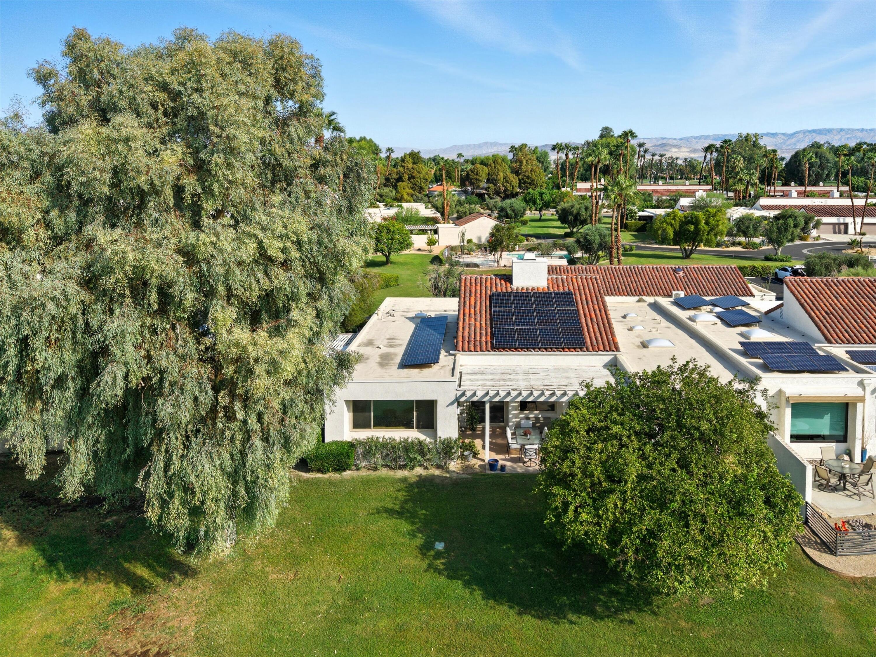 809 Inverness Drive Rancho Mirage, CA 92270 - Photo 6 of 36 a view of a city that has tall buildings
