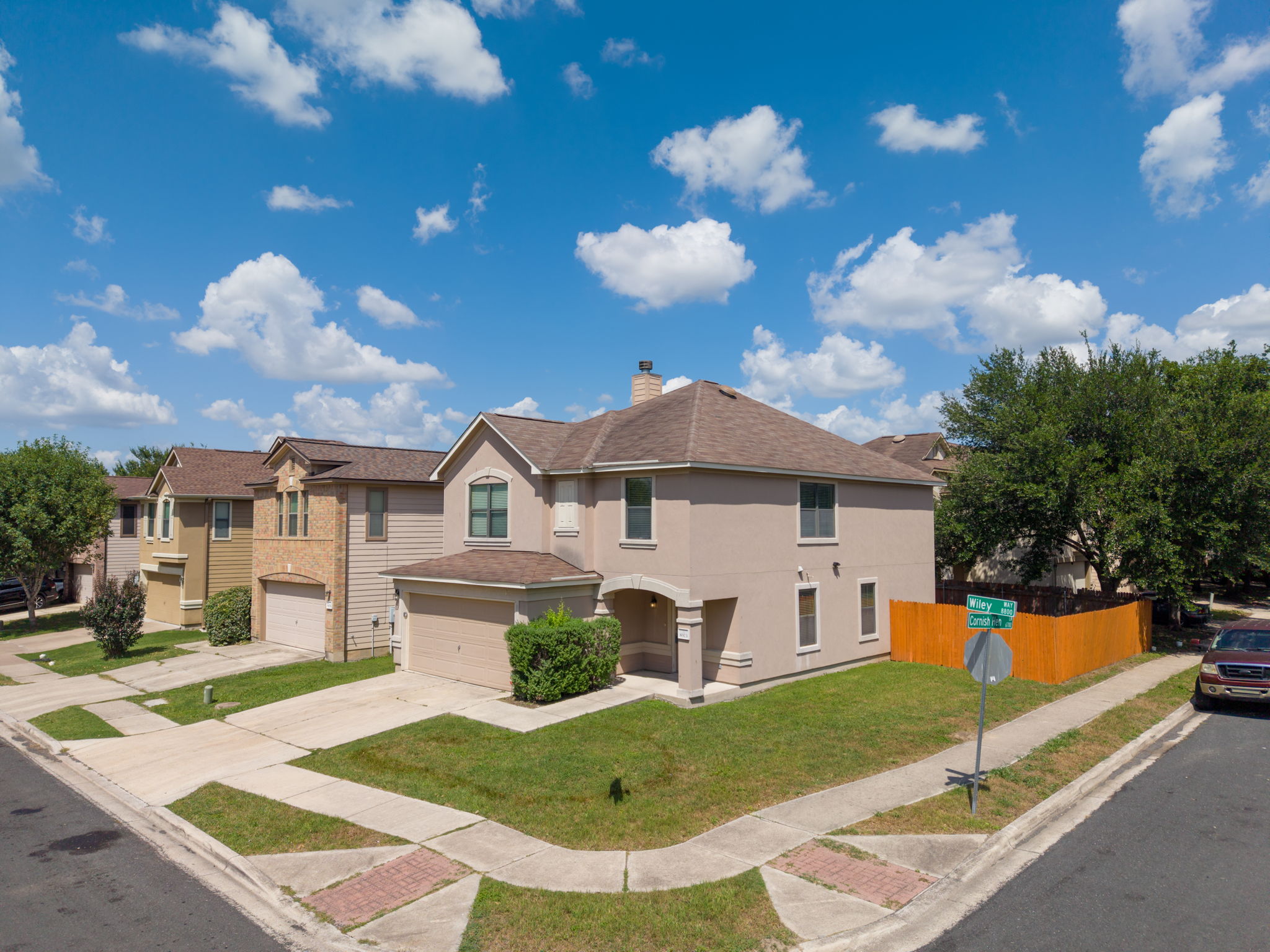 8813 Wiley Way Austin, TX 78747 - Photo 33 of 39 A corner lot residence, offering spacious living with an integrated garage and a private fenced yard.