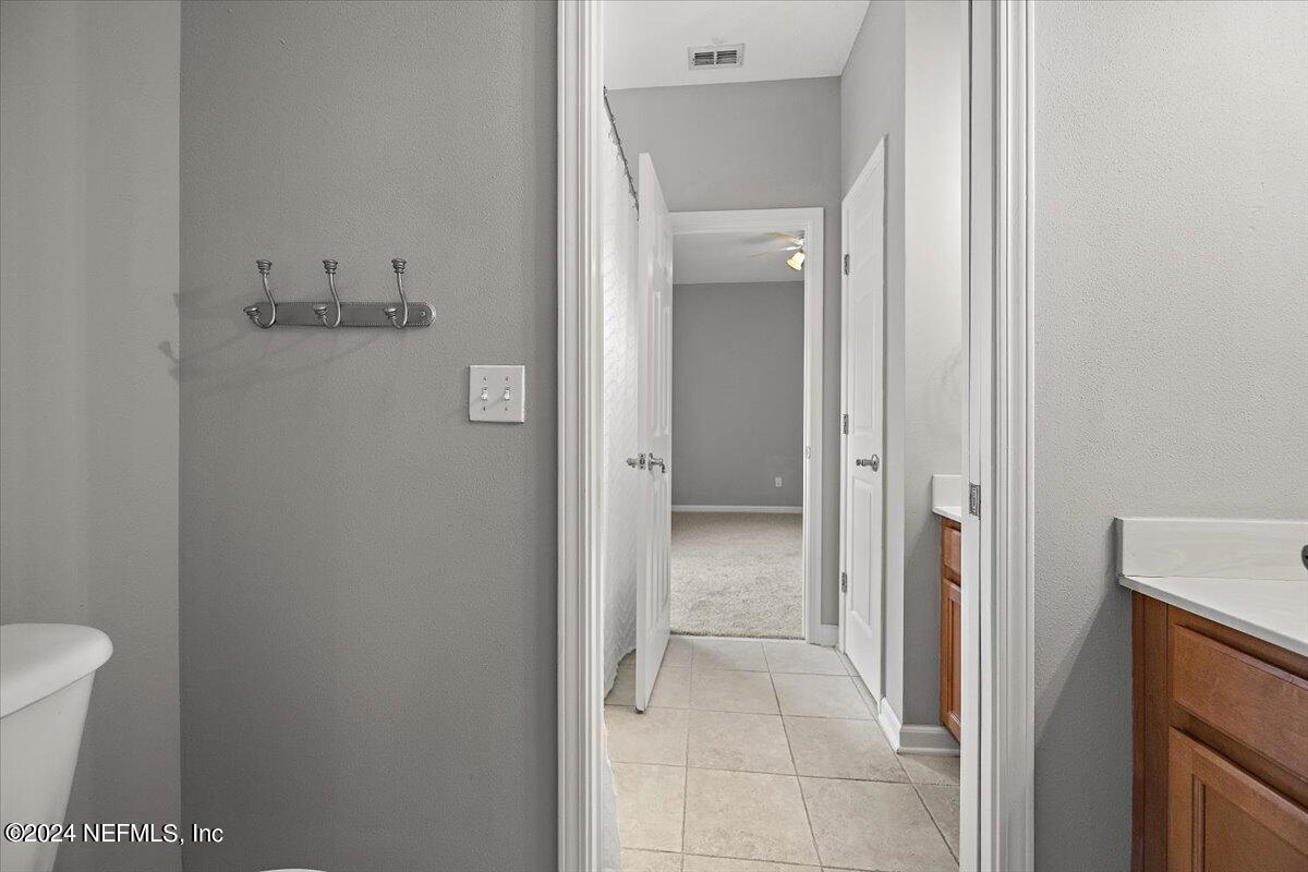 2045 River's Own Road St. Augustine, FL 32092 - Photo 26 of 43 a view of a bathroom from the hallway