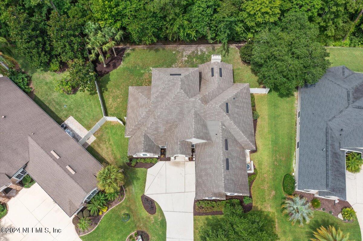 2045 River's Own Road St. Augustine, FL 32092 - Photo 3 of 43 an aerial view of a house with outdoor space and a lake view