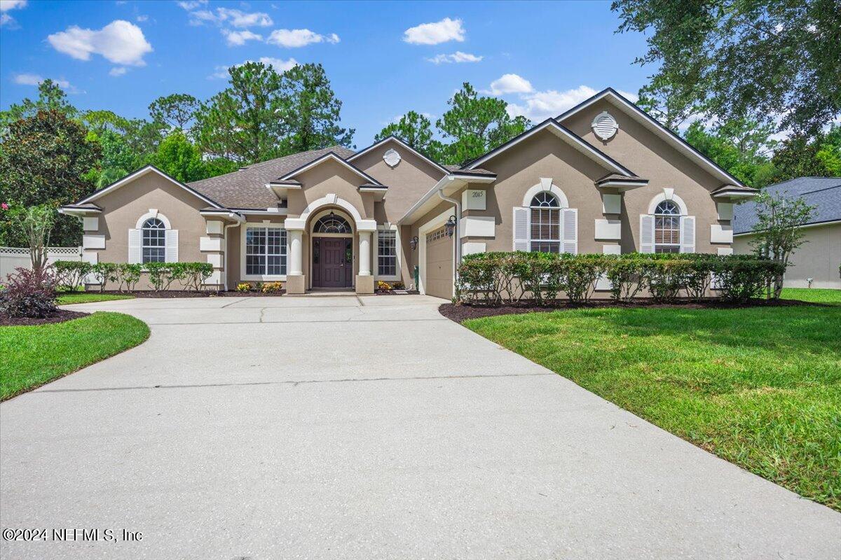 2045 River's Own Road St. Augustine, FL 32092 - Photo 43 of 43 a front view of a house with a yard