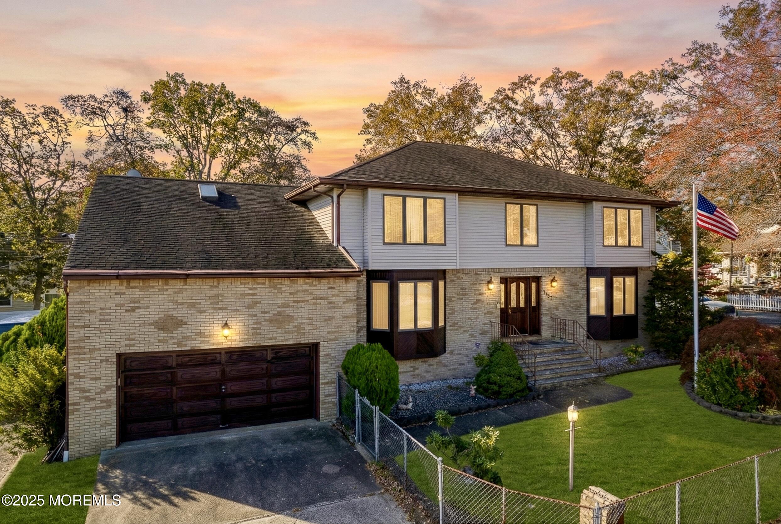 2003 Teakwood Road Toms River, NJ 08753 - Photo 1 of 47 a front view of a house with garden