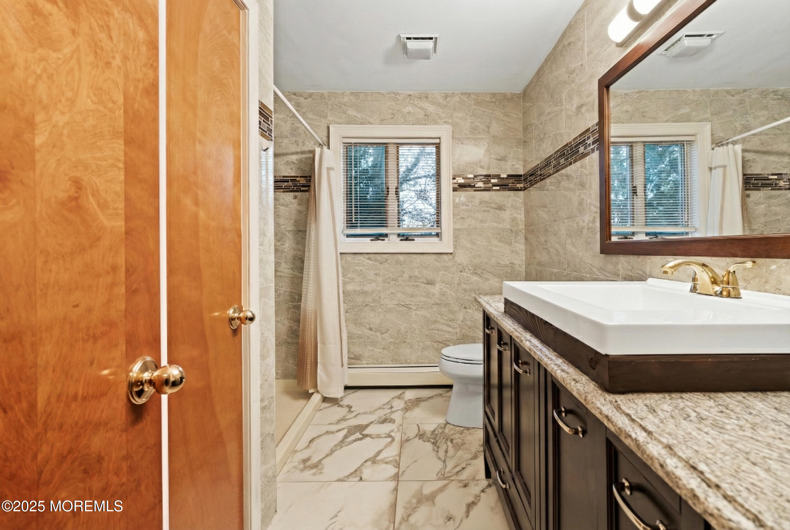 2003 Teakwood Road Toms River, NJ 08753 - Photo 18 of 47 a bathroom with a sink and a mirror