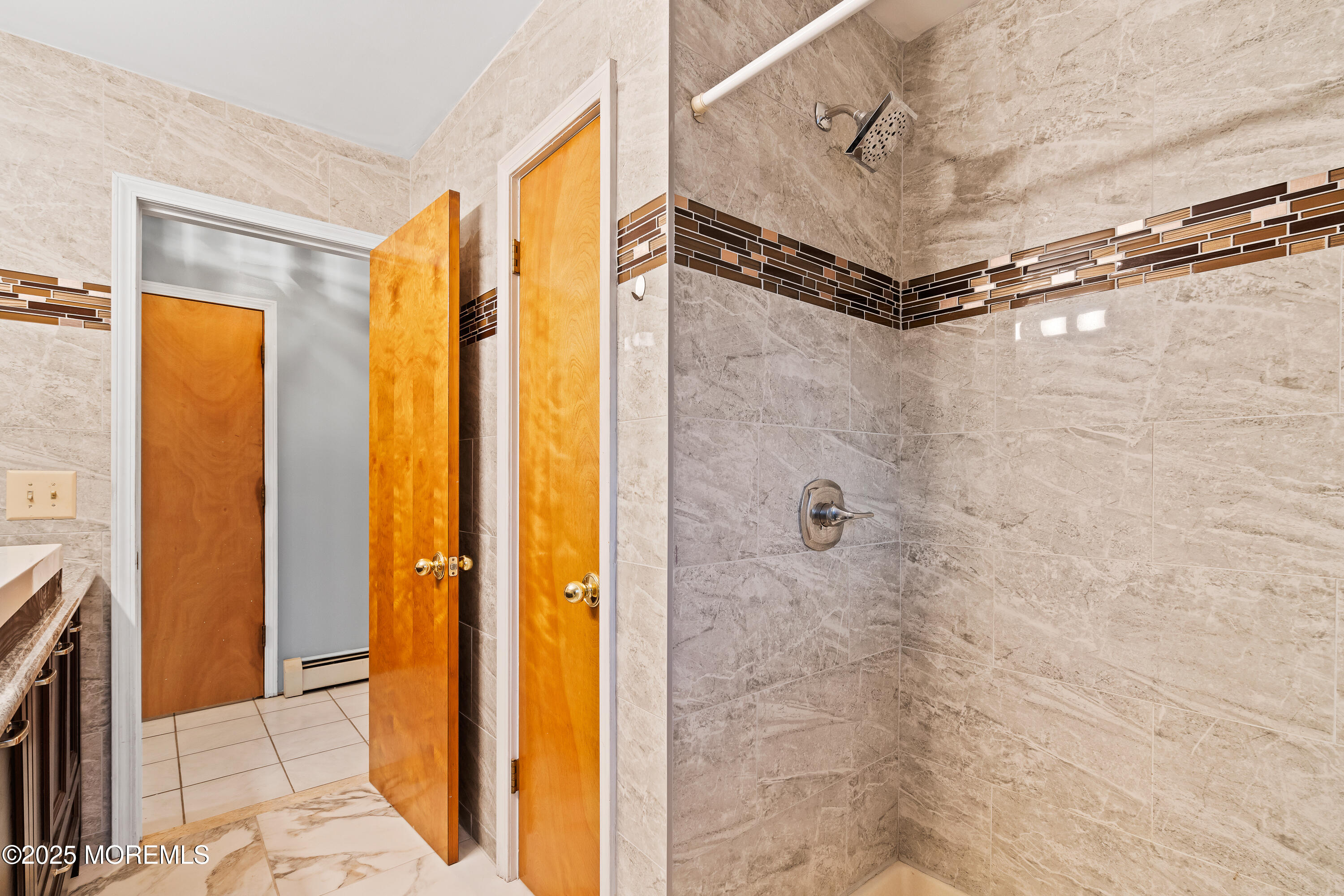 2003 Teakwood Road Toms River, NJ 08753 - Photo 19 of 47 a bathroom with a shower and a tub