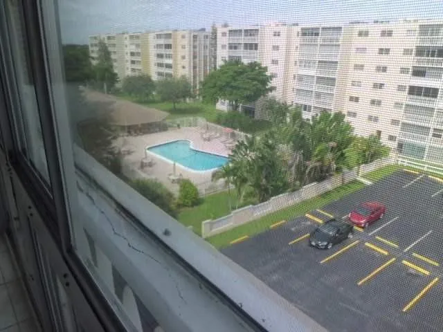 a view of a balcony with an outdoor space