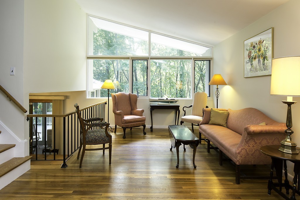 26 Partridge Road Lexington, MA 02420 - Photo 4 of 13 a living room with furniture and a large window