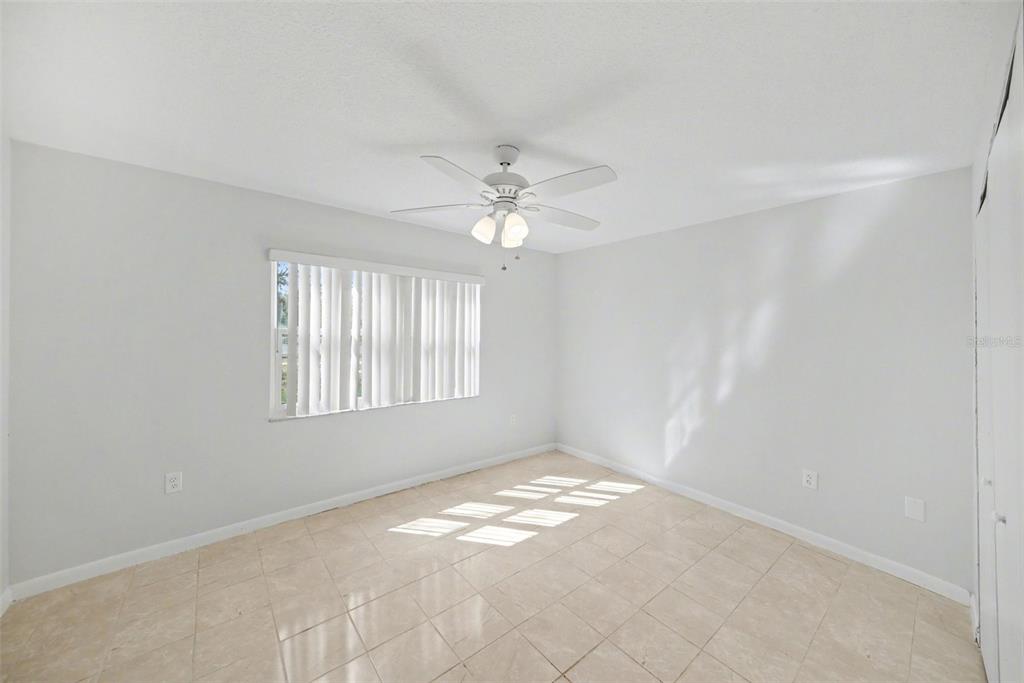 113 Ruskin Avenue Spring Hill, FL 34606 - Photo 18 of 32 a view of an empty room with a window