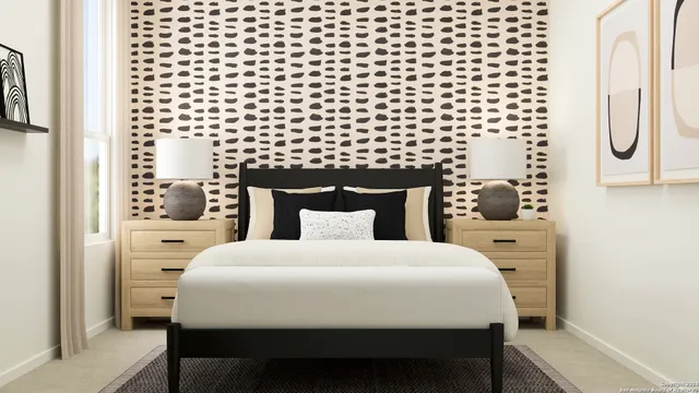 a large white bed in a white room