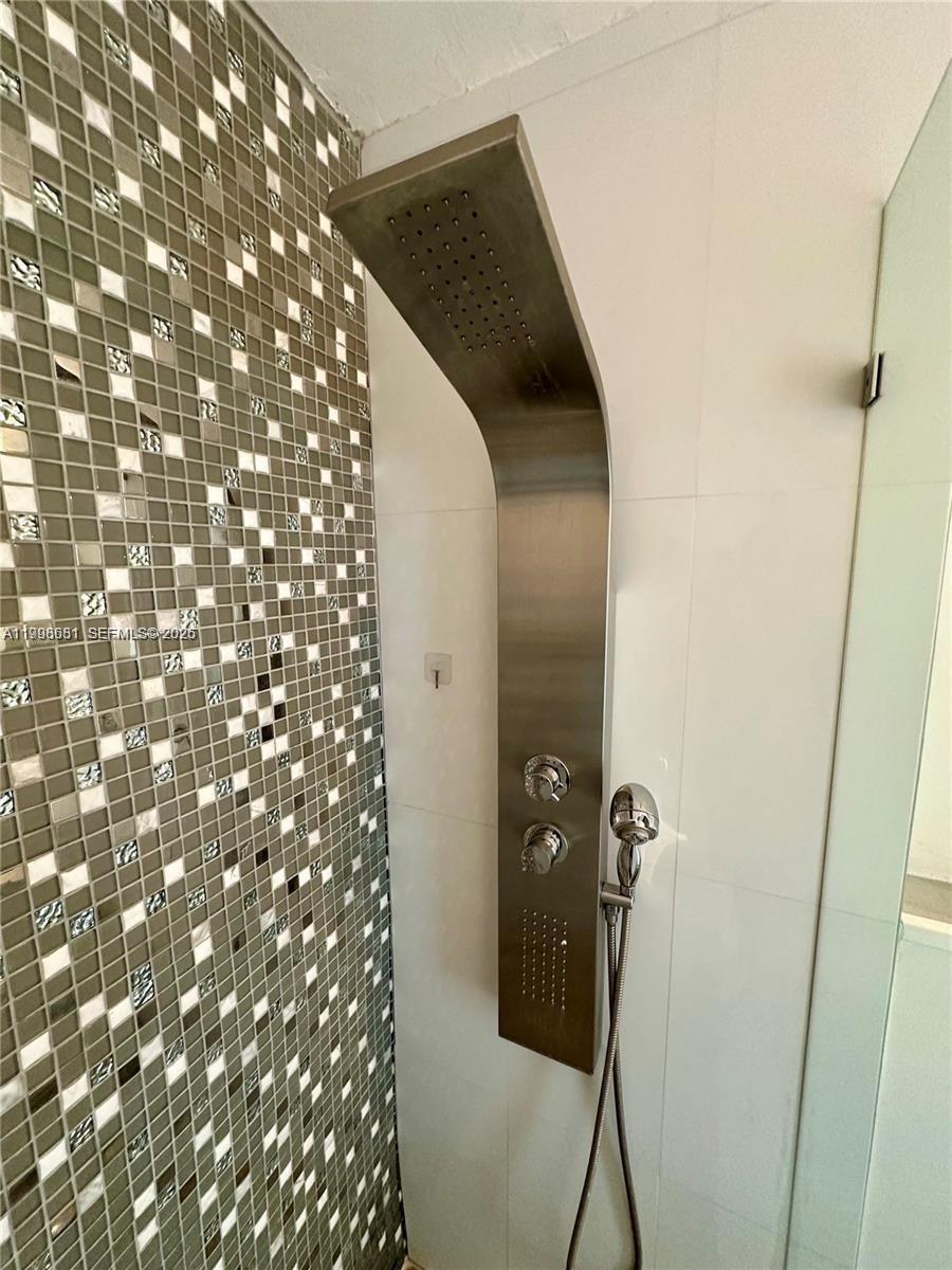 5424 Garfield Street Hollywood, FL 33021 - Photo 42 of 59 a bathroom with a shower