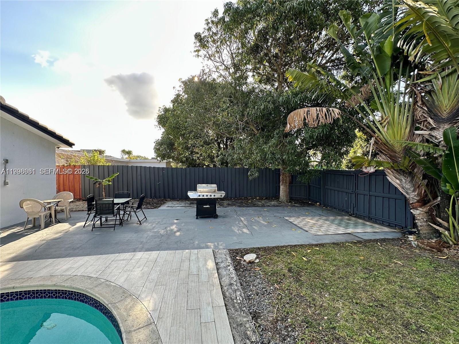 5424 Garfield Street Hollywood, FL 33021 - Photo 10 of 59 a view of outdoor sitting space with furniture