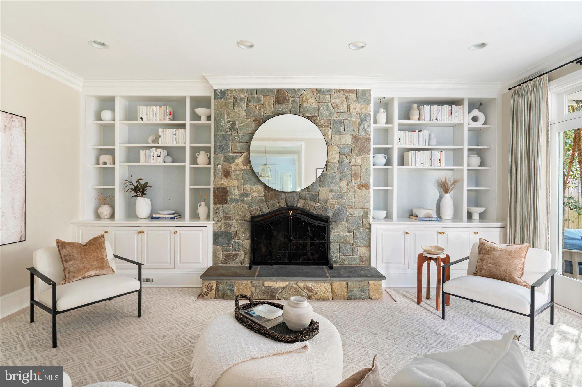 2950 Chain Bridge Road Northwest Washington, DC 20016 - Photo 15 of 50 a living room with furniture a rug and a fireplace