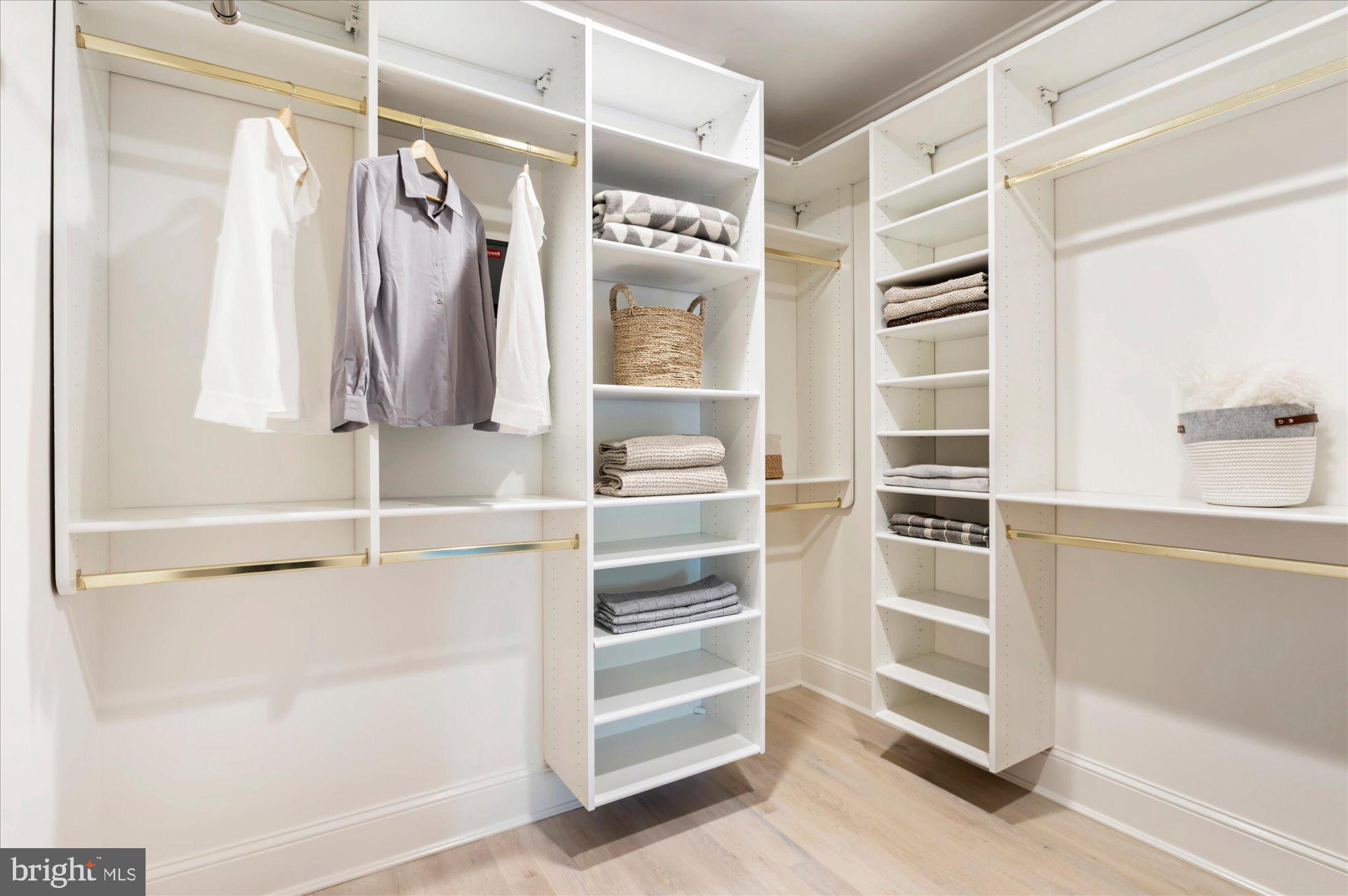 2950 Chain Bridge Road Northwest Washington, DC 20016 - Photo 24 of 50 a view of walk in closet with clothes and shoes