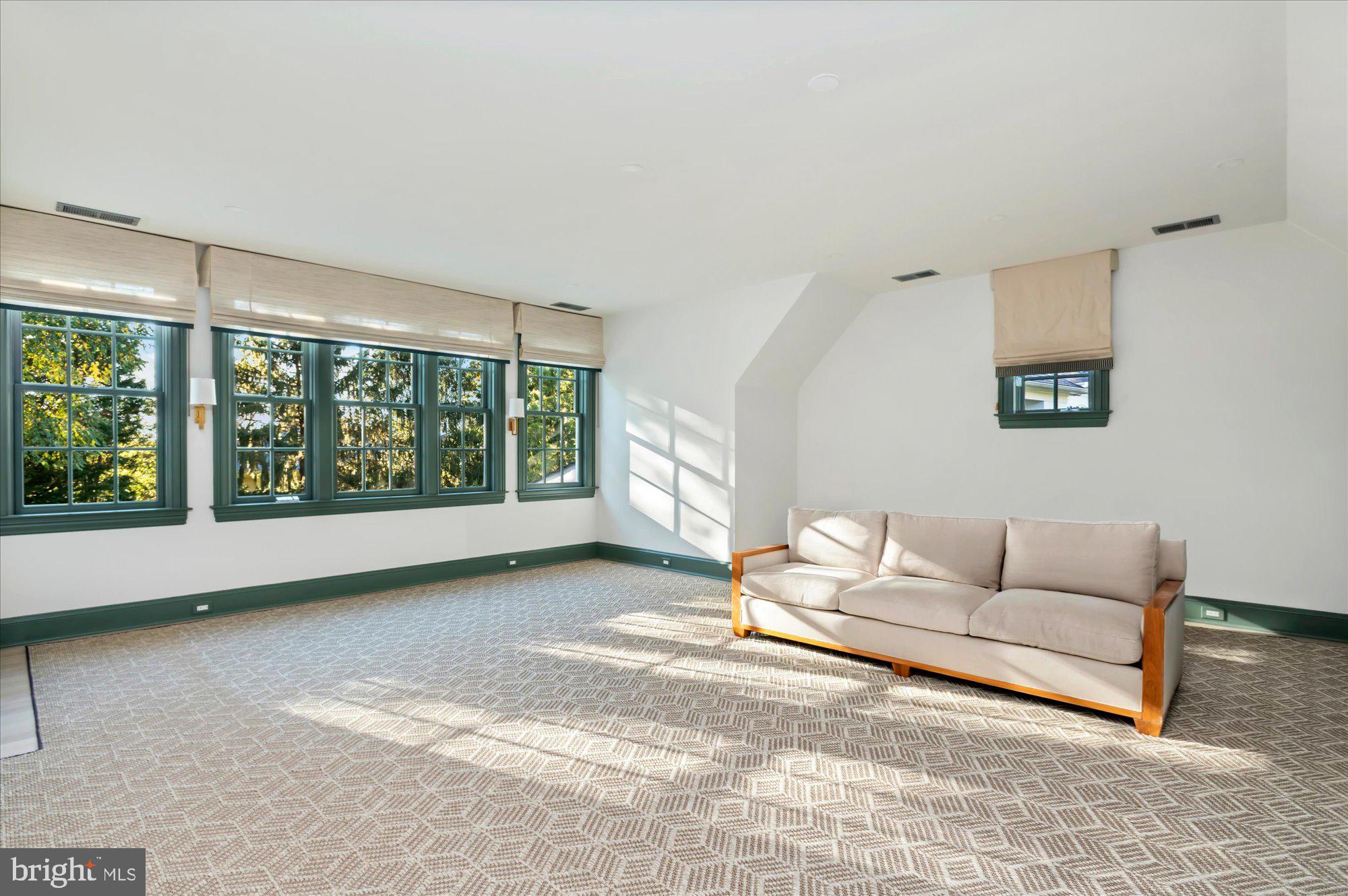 2950 Chain Bridge Road Northwest Washington, DC 20016 - Photo 30 of 50 a living room with furniture and a large window